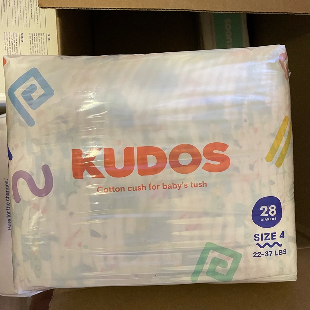 Kudos Diapers size 4 and wipes